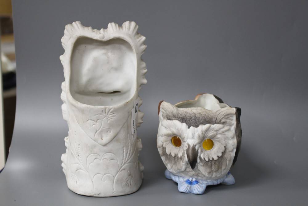 Two 19th century German coloured bisque novelty ornaments, one a night light modelled with cats, dog and owls faces, with coloured glas